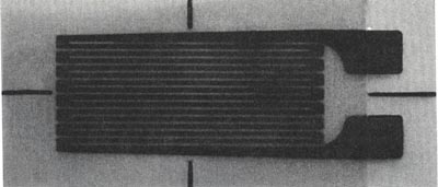 A typical bonded resistance strain gauge